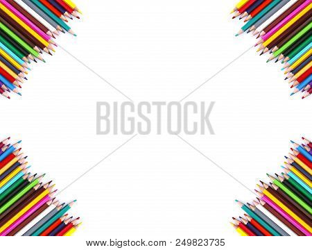Bright Colored Pencils On White Background. Back To School Design Elements. Empty Space For Text.