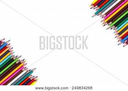 Colored Pencils On White Background. Back To School Design Elements. Empty Space For Text.