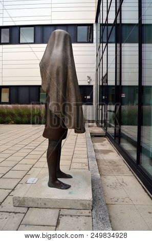 Art deco sculpture. View of architecture of the Ostfold Regional Hospital. June 17,2018. Osfold Region, Norway