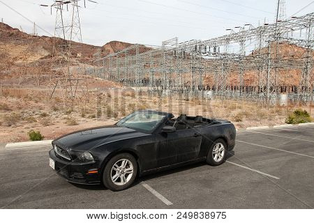 Arizona, Usa - April 4, 2014: Ford Mustang Parked Next To U.s. Route 66 In Arizona. The Famous Road 