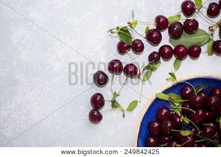 Fresh Sweet Cherries Bowl With Leaves