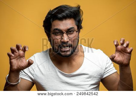 Hindoo Angry Guy Shows Attacking Claws. Man Is Ready To Attack The Opponent.indian Man Is Playing Wi
