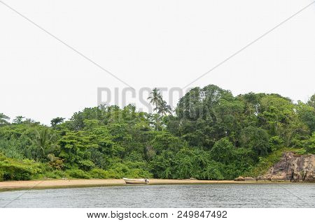 Motorboat On The Sandy Bank Of The River. Tropical Island In Sri Lank