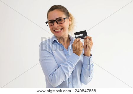Happy Female Cardholder Advertising Loyalty Program. Young Caucasian Woman In Office Wear Showing Ba