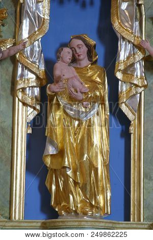 KOMOR ZACRETSKI - AUGUST 06: Virgin Mary with baby Jesus, statue on the altar in Chapel of Saint Vitus in Komor Zacretski, Croatia on August 06, 2017.