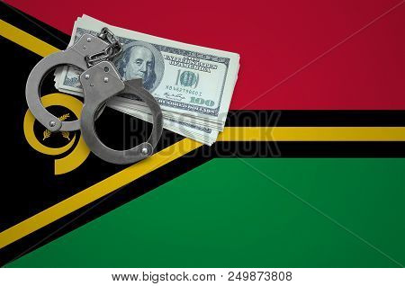 Vanuatu Flag  With Handcuffs And A Bundle Of Dollars. The Concept Of Breaking The Law And Thieves Cr