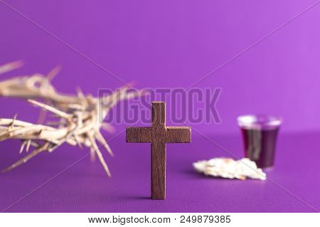 Symboles Of Christianity And The Communion On A Purple Background