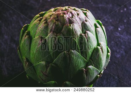 Artichoke. Close Up Of Artichoke Top View Dark Background. Macro.