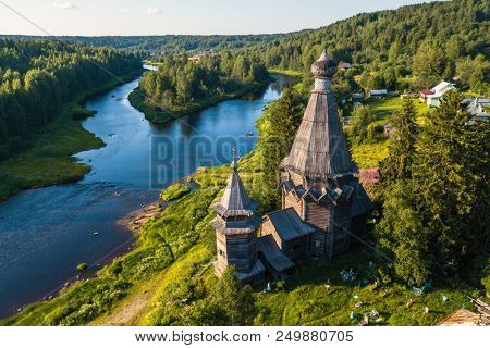 Bird's eye view of the Church of St. Nicholas (built 1696) in Soginicy village and Vazhinka river, Podporozhysky district. Green forests of Leningrad region and Republic of Karelia, Russia.
