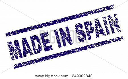 Made In Spain Stamp Seal Watermark With Scratced Style. Blue Vector Rubber Print Of Made In Spain Ti