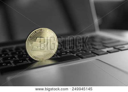 Dash Coin Symbol On Laptop. Concept Financial Currency, Crypto Currency Sign. Blockchain Mining. Dig