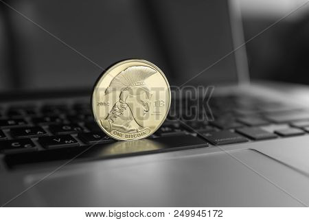 Titan Bitcoin Coin Symbol On Laptop. Concept Financial Currency, Crypto Currency Sign. Blockchain Mi