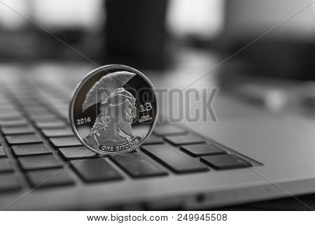 Titan Bitcoin Coin Symbol On Laptop. Concept Financial Currency, Crypto Currency Sign. Blockchain Mi