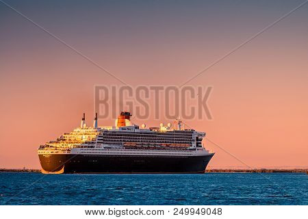 Adelaide, Australia - February 16, 2018: Cunard Line Rms Queen Mary 2 With People On Board Departing