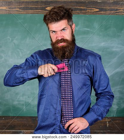 School Accident Prevention. School Stationery. Man Scruffy Use Stapler Dangerous Way. Hipster Teache