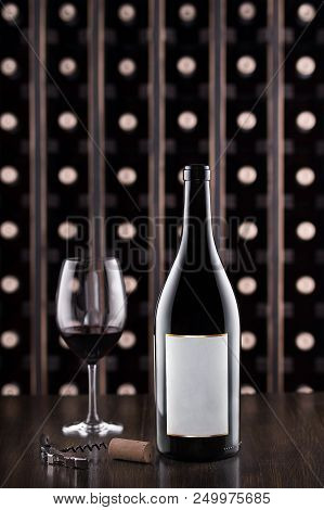 Glass Of Wine And Wine Bottle. Wine Testing At The Storage. Wine Cellar.with Space For Text, Selecti