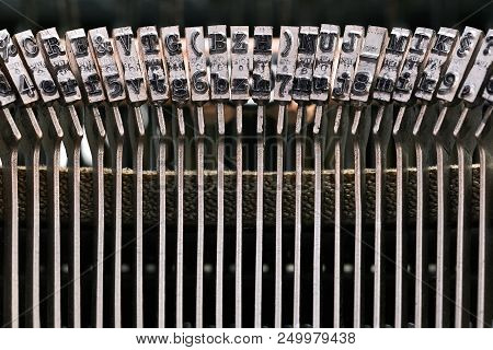 Beautiful Macro Photo Of Typebars Of A Retro Typewriter In The Studio. Horizontal.