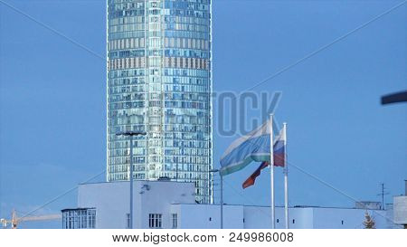 Skyscraper On A Sunny Summer Day. Stock. Urban Landscape On A Summer Day.