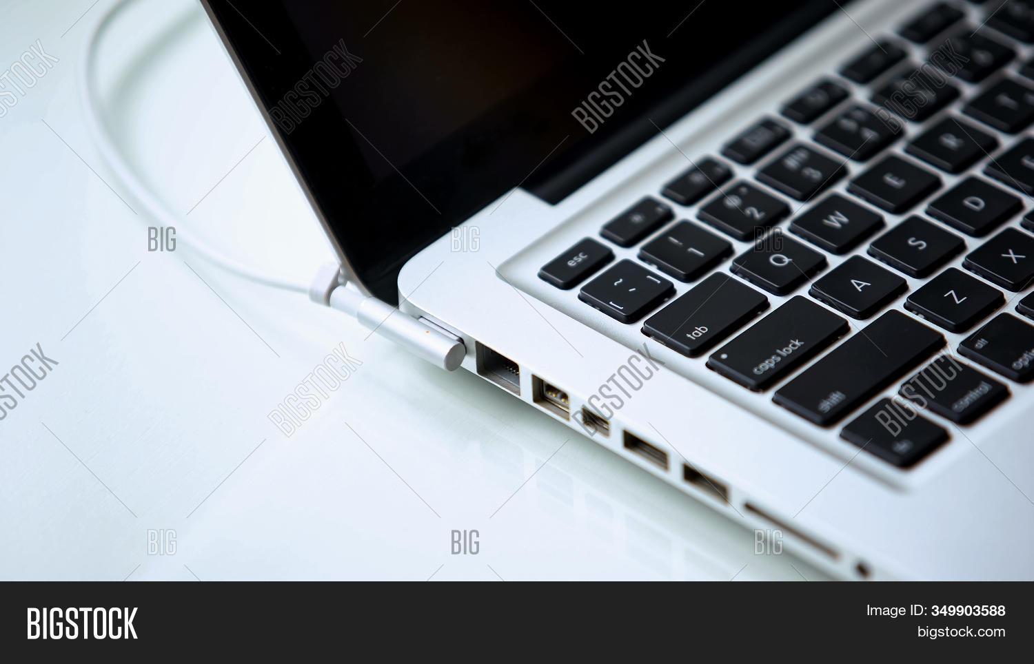 Computer Power Adapter Plugged In Laptop Power Adapter Image & Photo (Free Trial) | Bigstock