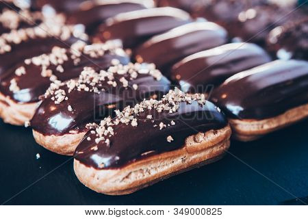 Traditional French Eclairs With Chocolate. Tasty Dessert. Home Made Cake Eclairs. Sweet. Dessert. Pa