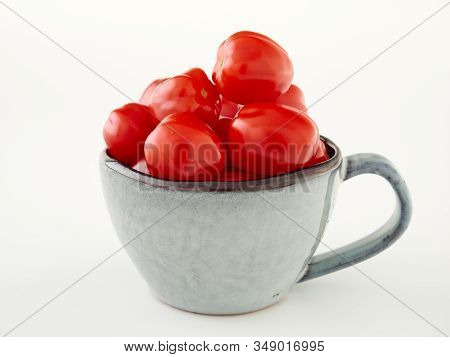 Ripe, Red Cherry Tomatoes Of The Confetto Variety.isolate.white Background