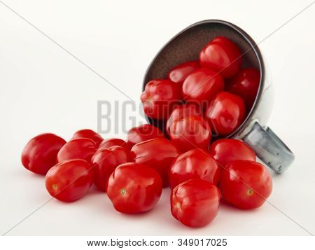 Ripe, Red Cherry Tomatoes Of The Confetto Variety.isolate.white Background