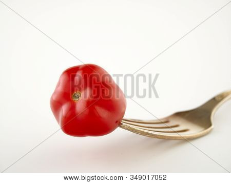Ripe, Red Cherry Tomatoes Of The Confetto Variety.isolate.white Background