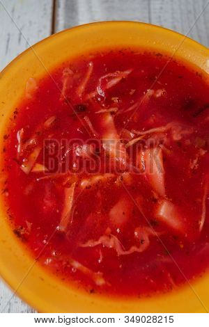 Traditional Ukrainian Russian Vegetable Borscht On The Old Wooden Background. Borscht. Borsch With Q