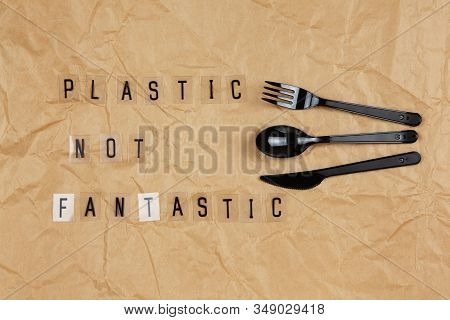 Disposable Black Appliances Fork, Spoon, Knife, Phrase From Letters On Transparent Base Plastic Not 