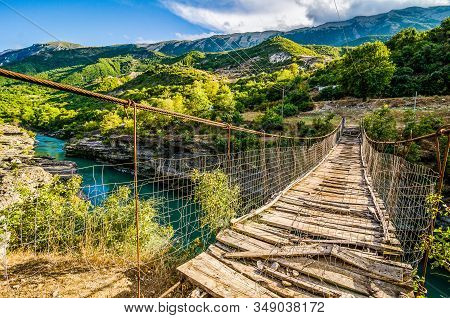 Old Broken Wooden Bridge Over Aoos River Near Permet In Albania