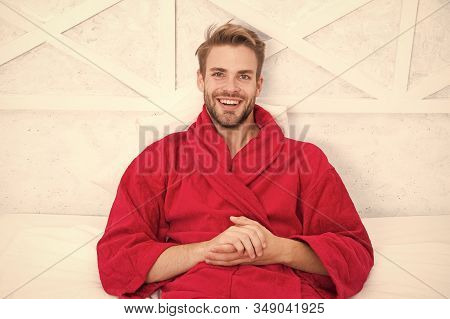 Guy In Bathrobe Relaxing. Relaxing Before Fall Asleep. Get Enough Amount Of Sleep Every Night. Maint