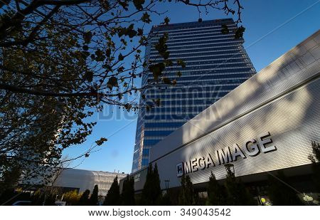 Bucharest, Romania - December 09, 2019: A Patch Of Light Falls On The Front Of The Mega Image Concep