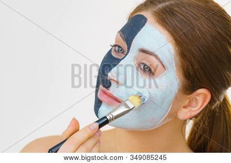 Girl Black Mask On Half Face Apply White Mud