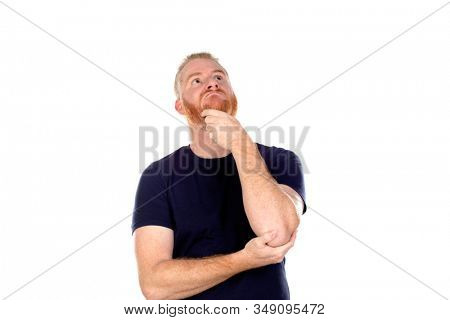 Red haired man with long beard thinking isolated on a white background