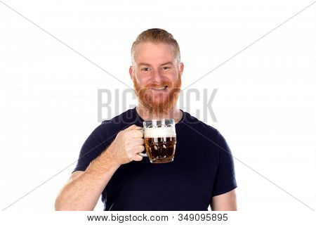 Red haired man with long beard drinking a beer isolated on a white background