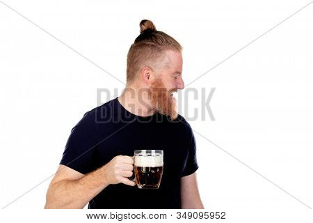 Red haired man with long beard drinking a beer isolated on a white background
