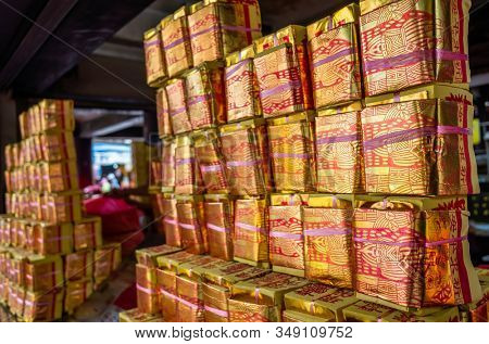 Nantou, Taiwan - September 27th, 2019: chinese joss gold papers at Zi Nan Temple, Nantou, Taiwan, Asia
