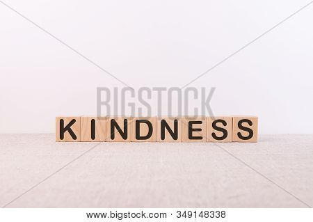 Kindness Word Made With Building Blocks On A Light Background