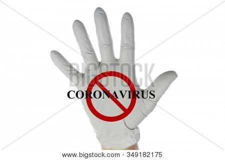 2019 Novel Coronavirus. 2019-nCoV. Wuhan, China 2019 Novel Coronavirus. Human Hand with Latex Glove with NO CORONAVIRUS logo on the palm. Isolated on white. Room for text. Clipping Path. Warning Sign.