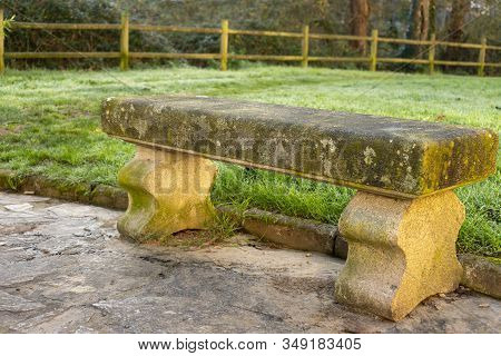 Stone Bench In The Park To Rest And Relax