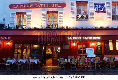 Paris, France-february 02 ,2020 : La Mere Catherine At Rainy Morning . It Is A Traditional French Re