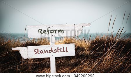 Street Sign The Direction Way To Reform Versus Standstill
