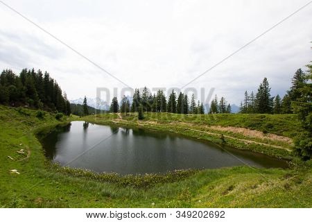 Beautiful Lake Flesch In The Swiss Mountains On A Cloudy Day