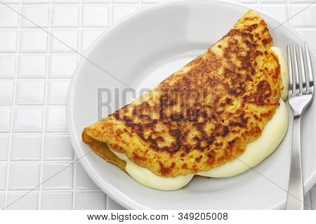 cachapa, venezuelan corn pancake with handmade cheese