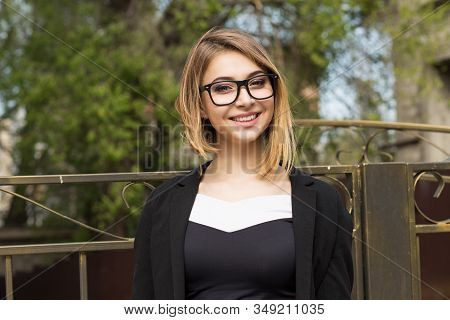 Woman Outdoors. Half Length Body Woman Girl Looking At You Camera Smile On Face, Black Suit Formal W