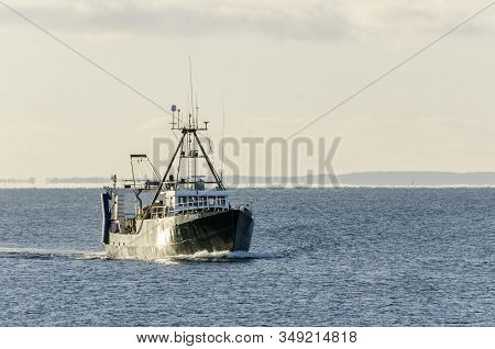 New Bedford, Massachusetts, Usa - January 30, 2020: Morning Sun Reflecting Off Commercial Fishing Bo