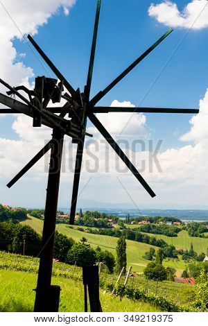 vineyard with windmill called klapotetz in south of Styria, Austria