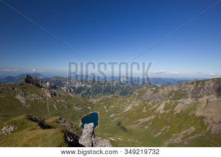 View Over A Valley In The Swiss Mountains On A Cloudless Day