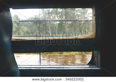 Flooded Tropical Forest Seen From An Indian Train Window After Taifun Storm And Heavy Rain, Kerala, 