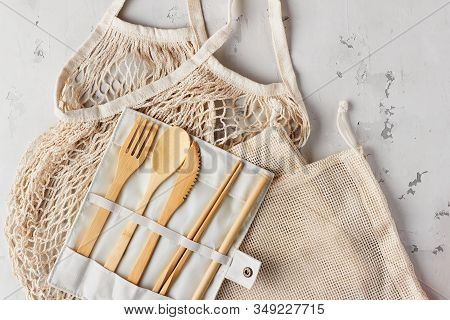 Zero Waste, Plastic-free And Eco-friendly Lifestyle. Cotton Mesh Bag And Bamboo Cutlery For Package 